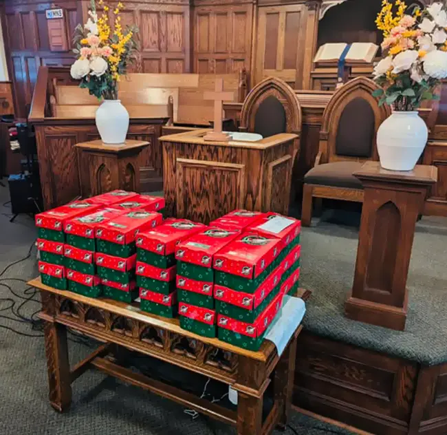Church furniture setup with chairs and table at First Baptist Church Port Hope